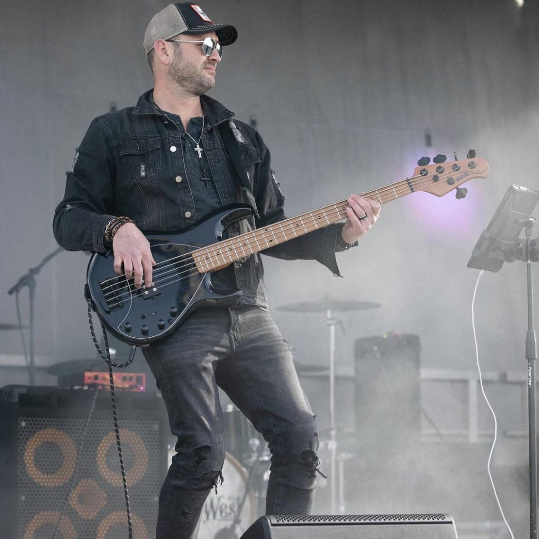 James Adam Kohout Playing bass